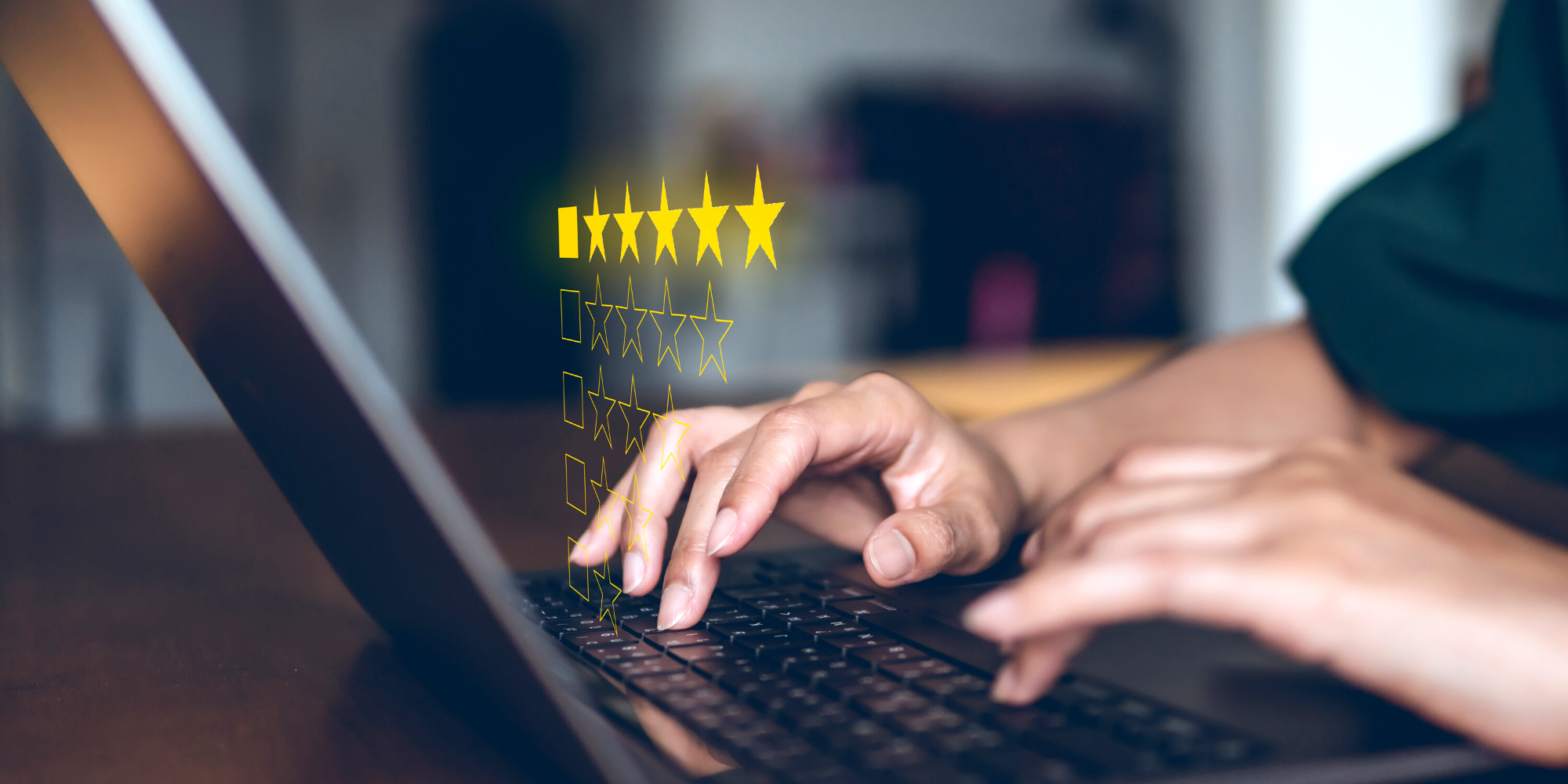Man typing on keyboard with holographic star rating concept